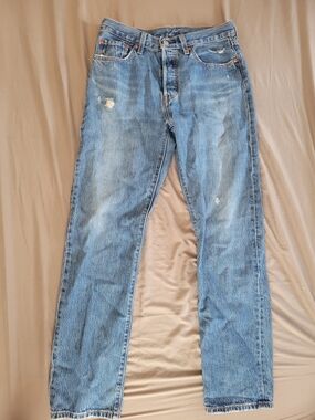 Levi's Light Blue Straight Jeans with Subtle Distressing